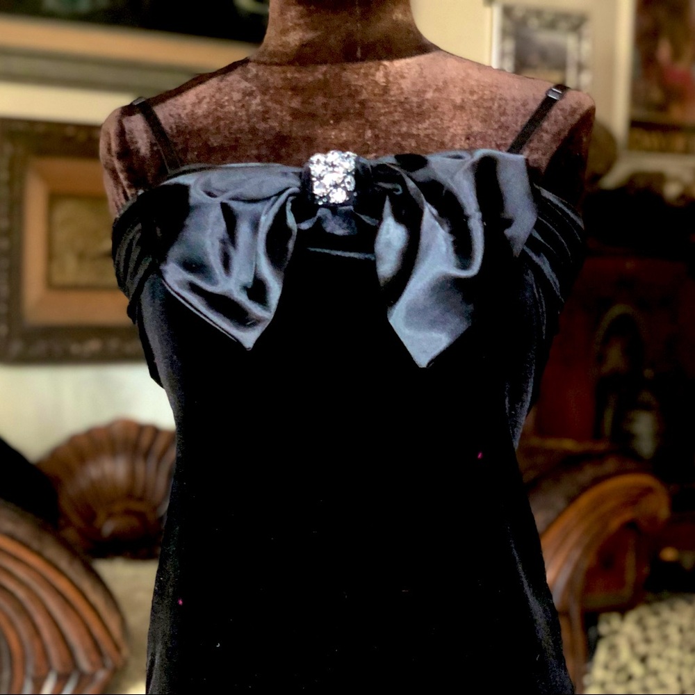 Big bow and rhinestone dress.